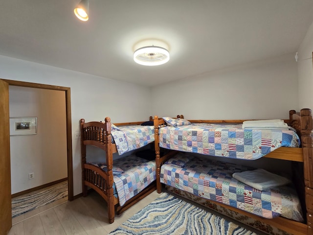 20758 Pike Ave, Aitkin, MN 56431 - bedroom with baseboards and light wood finished floors