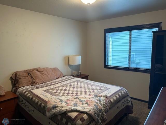 959 29th Ave W, West Fargo, ND 58078 - carpeted bedroom featuring baseboards