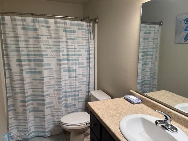 959 29th Ave W, West Fargo, ND 58078 - bathroom featuring vanity and a shower with shower curtain
