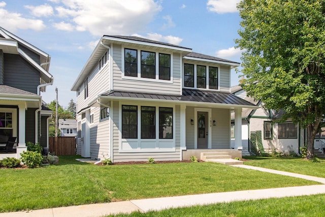 2084 Palace Ave, Saint Paul, MN 55105 - view of front of home featuring a standing seam roof, a porch, and a metal roof
