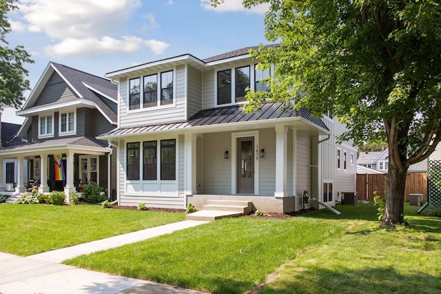 2084 Palace Ave, Saint Paul, MN 55105 - view of front of home with a porch, a standing seam roof, and a metal roof