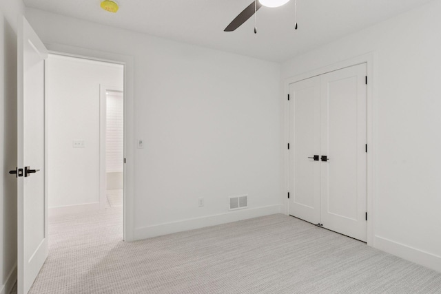 2084 Palace Ave, Saint Paul, MN 55105 - unfurnished bedroom with light colored carpet, a ceiling fan, and a closet