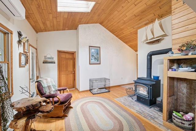 62405 Delta Lake Rd, Delta, WI 54847 - living area with a wall mounted AC, vaulted ceiling, wooden ceiling, wood finished floors, and a wood stove