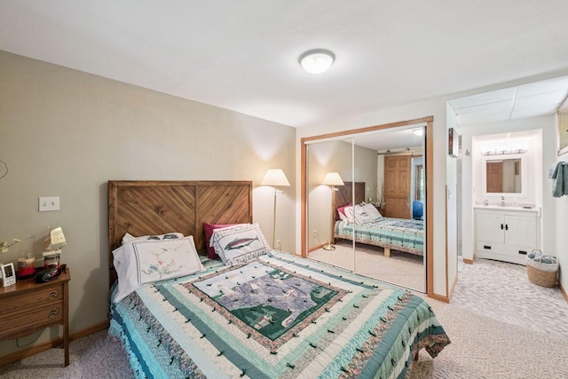 62405 Delta Lake Rd, Delta, WI 54847 - bedroom with carpet, a closet, and connected bathroom