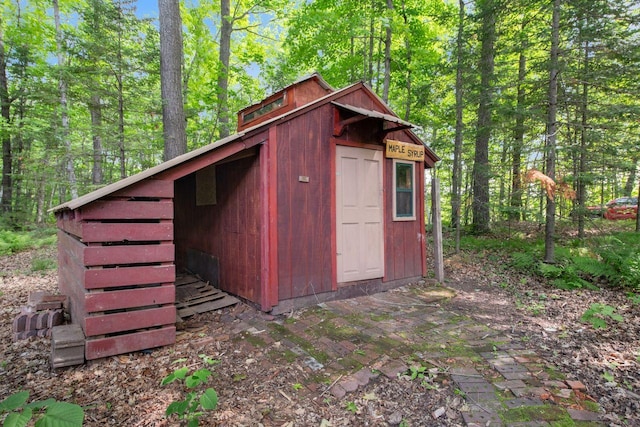 62405 Delta Lake Rd, Delta, WI 54847 - view of outbuilding with a forest view