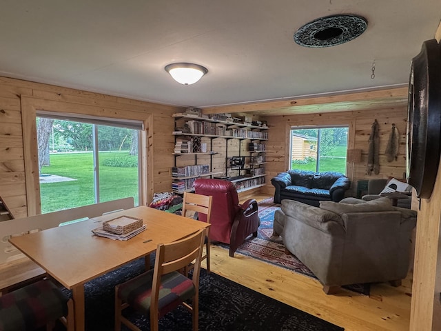 17700 78th St SW, Cokato, MN 55321 - dining room featuring wooden walls and wood finished floors