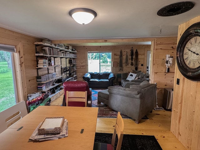 17700 78th St SW, Cokato, MN 55321 - living room with wood walls, wood finished floors, and healthy amount of natural light