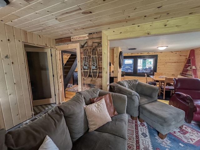 17700 78th St SW, Cokato, MN 55321 - living area with wooden walls, stairway, and wooden ceiling