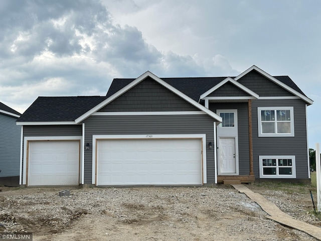 17360 62nd St NE, Otsego, MN 55330 - view of front of property featuring an attached garage and driveway