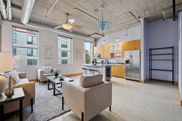 918 3rd St N Unit 210, Minneapolis, MN 55401 - living area featuring a ceiling fan, beverage cooler, and light tile patterned floors