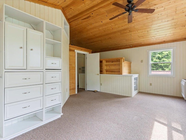 33277 308th Ln, Aitkin, MN 56431 - unfurnished bedroom with wood ceiling, light carpet, wood walls, and lofted ceiling