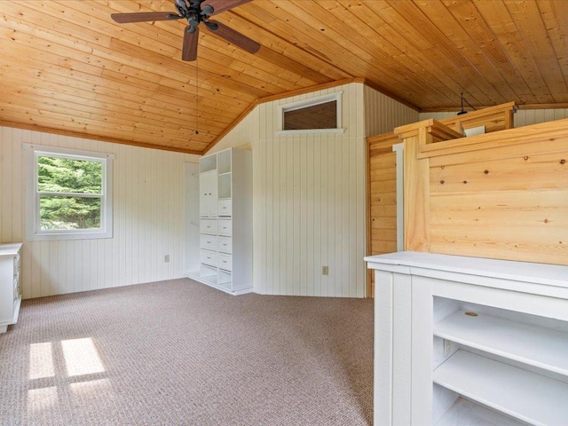 33277 308th Ln, Aitkin, MN 56431 - empty room featuring wood ceiling, vaulted ceiling, a ceiling fan, wooden walls, and carpet flooring