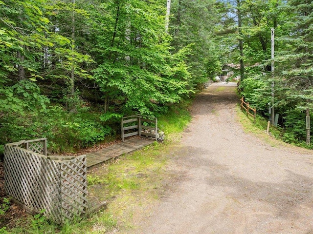 33277 308th Ln, Aitkin, MN 56431 - view of dirt / gravel road featuring a wooded view