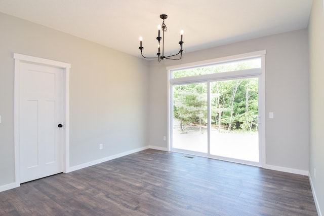 21705 Willys St NE, East Bethel, MN 55011 - unfurnished room featuring a chandelier and dark wood finished floors