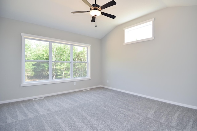 21705 Willys St NE, East Bethel, MN 55011 - carpeted empty room with lofted ceiling and ceiling fan