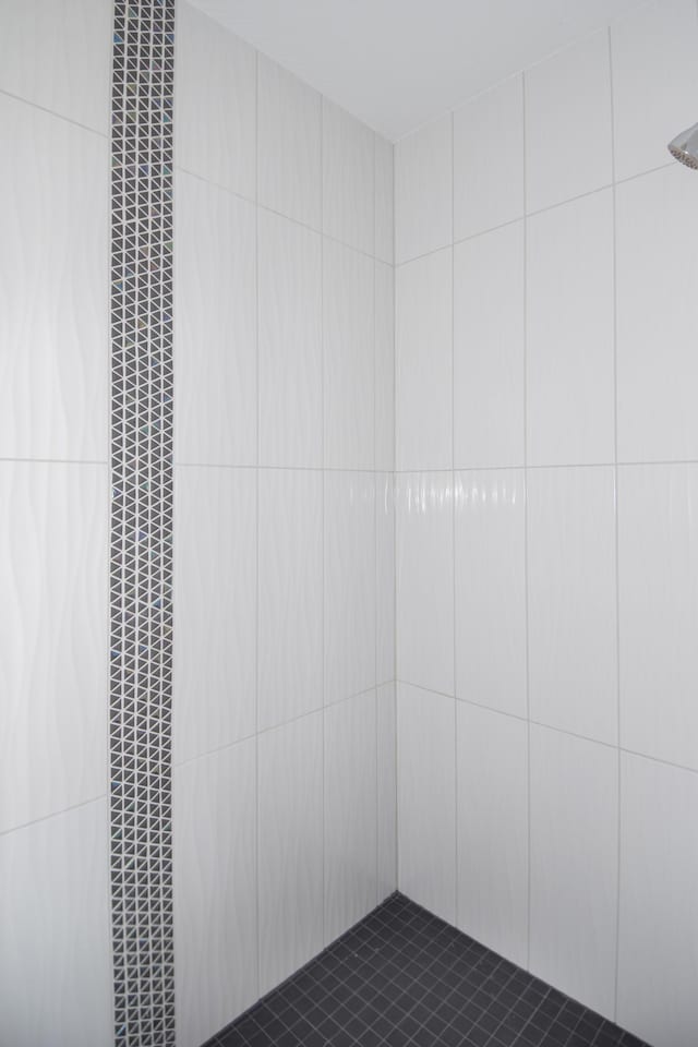 21705 Willys St NE, East Bethel, MN 55011 - bathroom with tiled shower and a heating unit