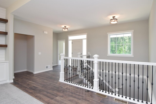 21705 Willys St NE, East Bethel, MN 55011 - hall with an upstairs landing and wood finished floors
