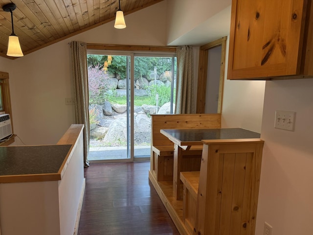 2161 Cardinal Ln, Mound, MN 55364 - kitchen with dark wood-style flooring, lofted ceiling, wooden ceiling, dark countertops, and pendant lighting