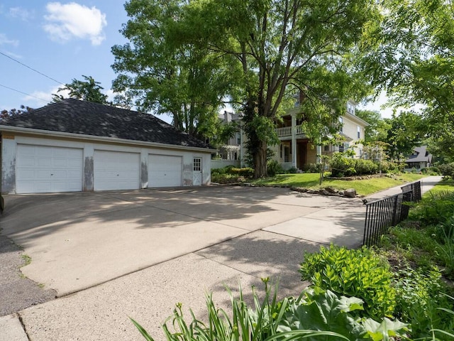 2320 Humboldt Ave S, Minneapolis, MN 55405 - view of front facade with a garage and an outdoor structure