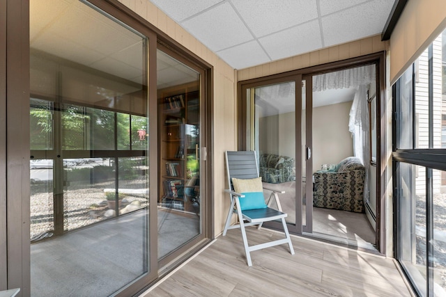 2485 Canabury Dr Unit 112, Little Canada, MN 55117 - sunroom / solarium featuring wood finished floors and a drop ceiling