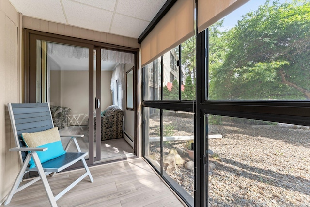 2485 Canabury Dr Unit 112, Little Canada, MN 55117 - sunroom / solarium featuring a baseboard radiator and plenty of natural light