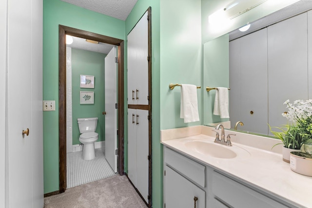 2485 Canabury Dr Unit 112, Little Canada, MN 55117 - bathroom featuring vanity and a textured ceiling
