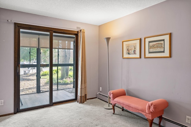2485 Canabury Dr Unit 112, Little Canada, MN 55117 - living area featuring light colored carpet, a baseboard heating unit, and a textured ceiling