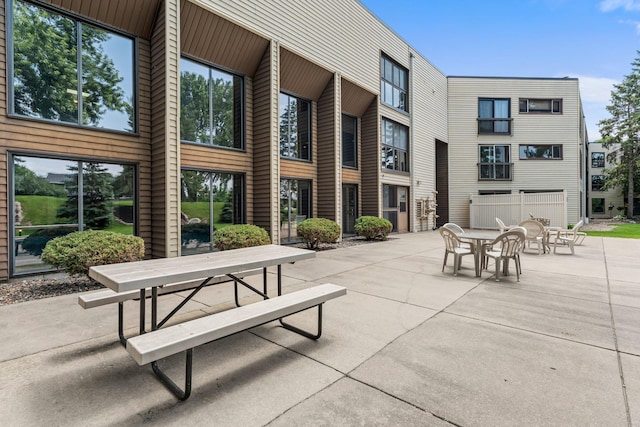 2485 Canabury Dr Unit 112, Little Canada, MN 55117 - view of patio featuring outdoor dining area