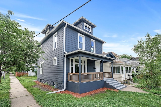 598 Western Ave N, Saint Paul, MN 55103 - american foursquare style home featuring a porch and a front yard