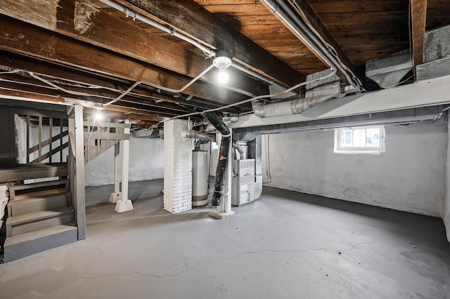 598 Western Ave N, Saint Paul, MN 55103 - below grade area with gas water heater, stairway, and heating unit