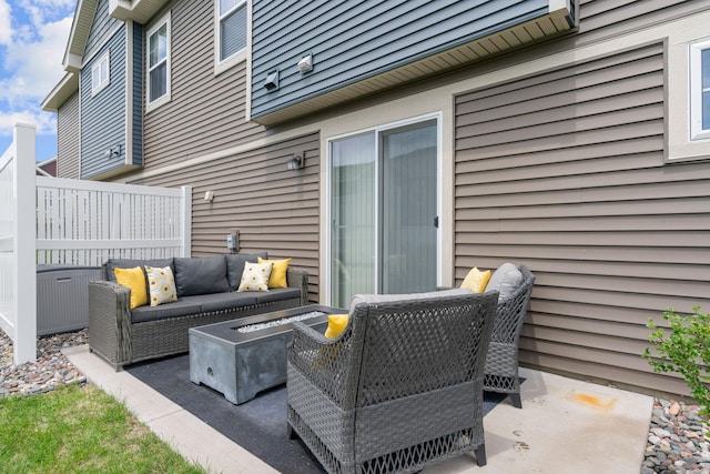 7237 Ada Dr, Lino Lakes, MN 55038 - view of patio with an outdoor living space with a fire pit