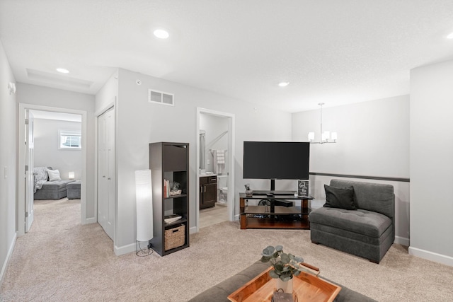 7237 Ada Dr, Lino Lakes, MN 55038 - living room with light carpet, a chandelier, and recessed lighting