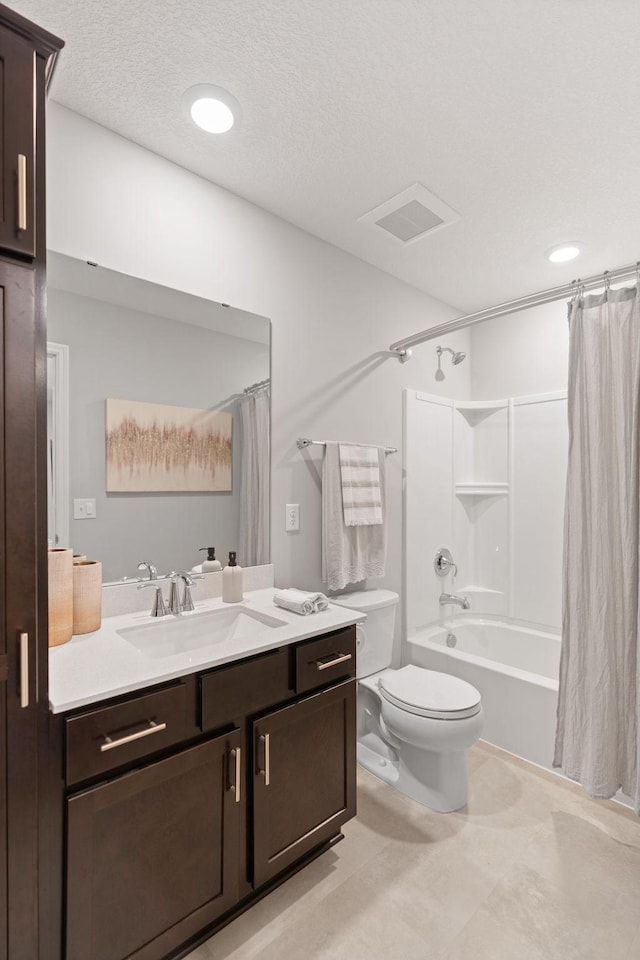 7237 Ada Dr, Lino Lakes, MN 55038 - full bathroom with vanity, shower / tub combo, and a textured ceiling