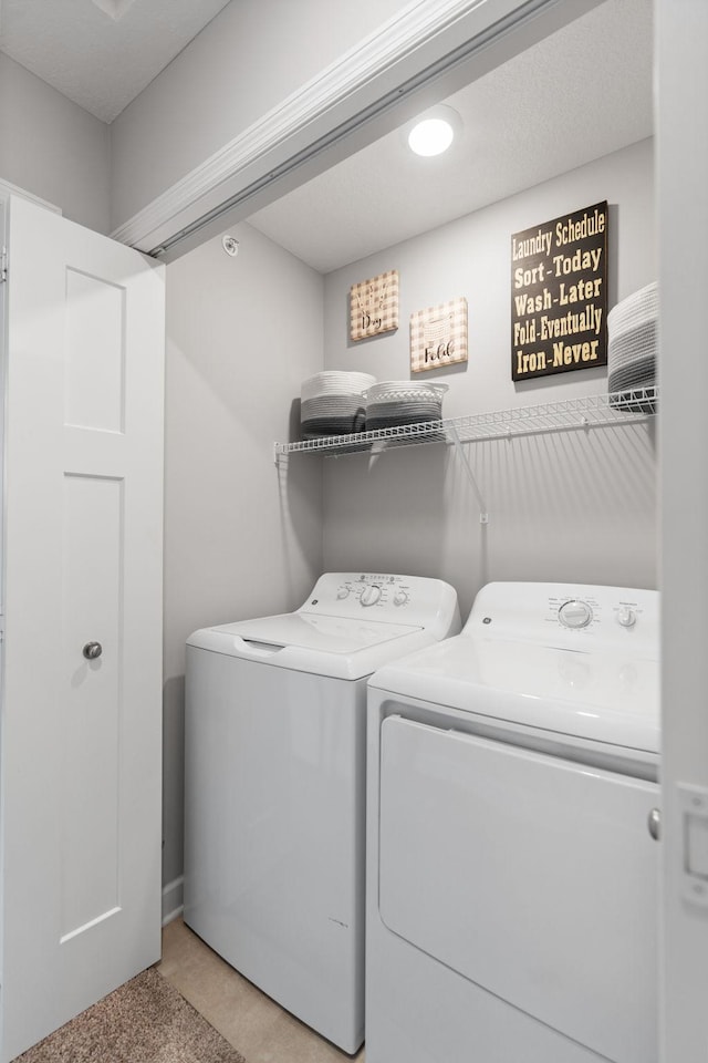 7237 Ada Dr, Lino Lakes, MN 55038 - laundry area with independent washer and dryer and light carpet