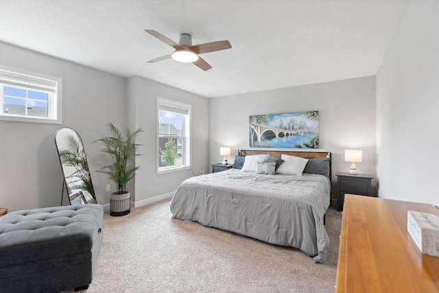 7237 Ada Dr, Lino Lakes, MN 55038 - carpeted bedroom with multiple windows and ceiling fan