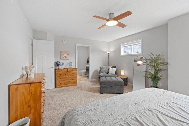7237 Ada Dr, Lino Lakes, MN 55038 - carpeted bedroom with connected bathroom and ceiling fan