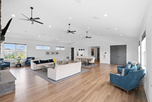 7237 Ada Dr, Lino Lakes, MN 55038 - living room with ceiling fan, recessed lighting, lofted ceiling, and light wood-style floors