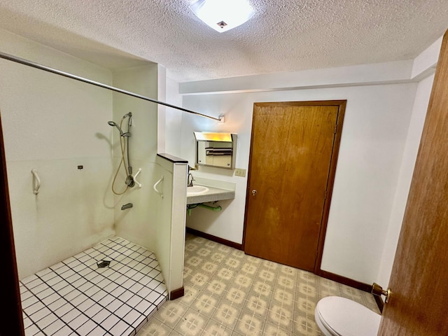 16033 Popplewood Rd NE, Hines Twp, MN 56647 - bathroom featuring a stall shower and a textured ceiling