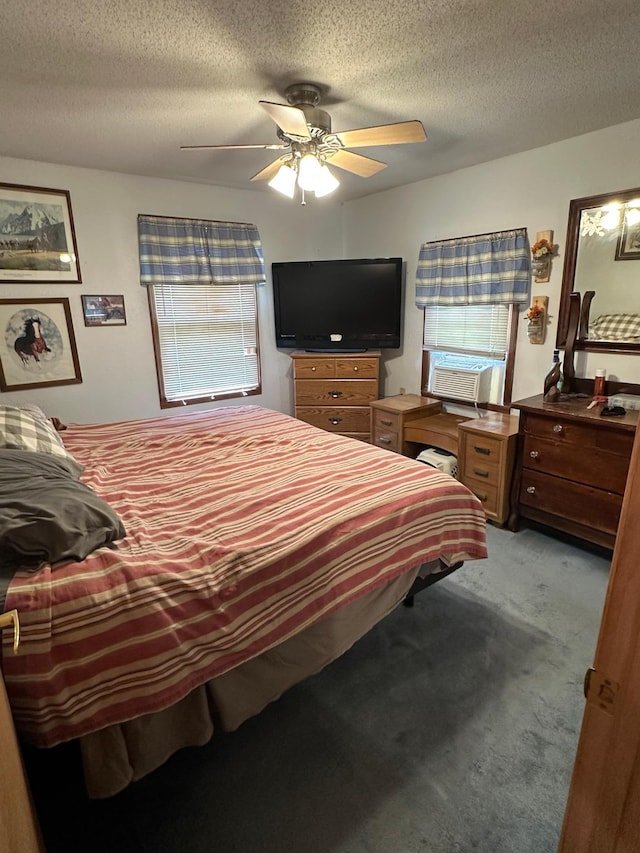 1374 State Highway 11 SE, Baudette, MN 56623 - bedroom featuring cooling unit, multiple windows, light colored carpet, a textured ceiling, and ceiling fan