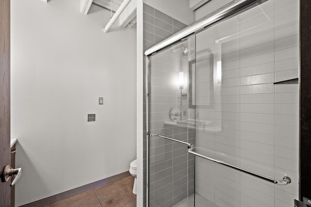 730 Stinson Blvd Unit 504, Minneapolis, MN 55413 - full bathroom with a shower stall, tile patterned flooring, and vanity