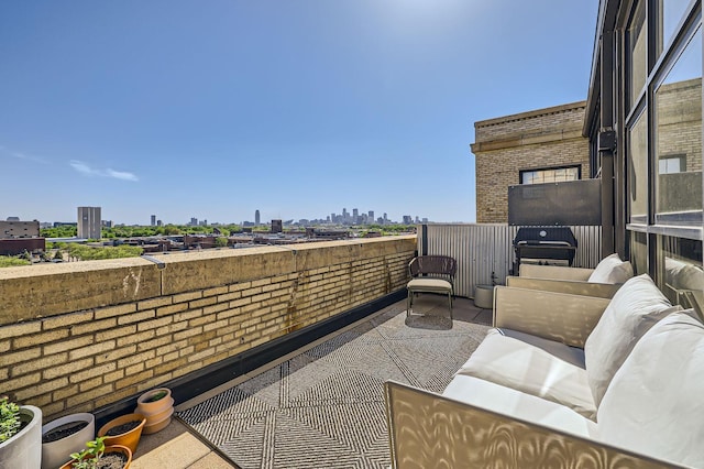 730 Stinson Blvd Unit 504, Minneapolis, MN 55413 - view of patio featuring a skyline view and an outdoor living space