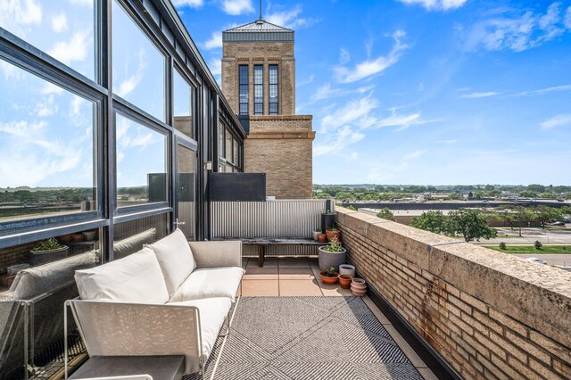 730 Stinson Blvd Unit 504, Minneapolis, MN 55413 - balcony featuring outdoor lounge area