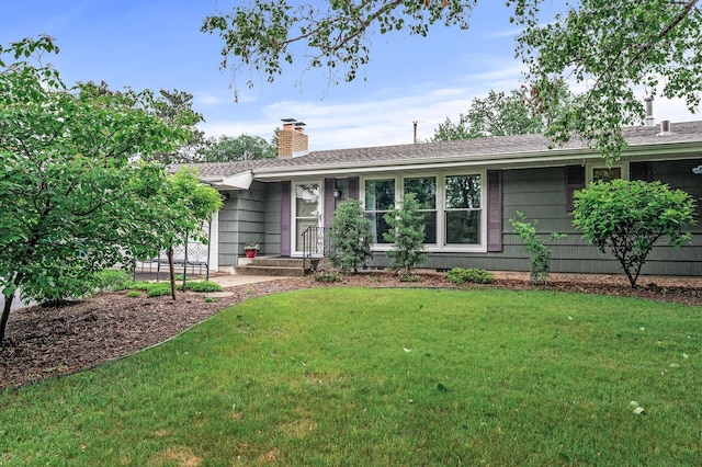 6781 Plaza Curv NE, Fridley, MN 55432 - single story home with a front yard and a chimney