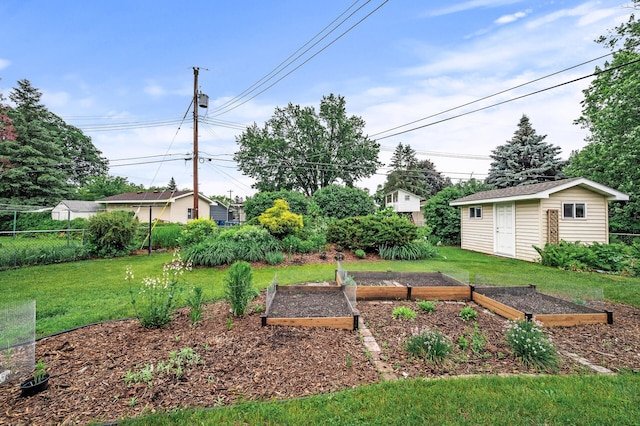 6781 Plaza Curv NE, Fridley, MN 55432 - view of yard with a garden and an outbuilding