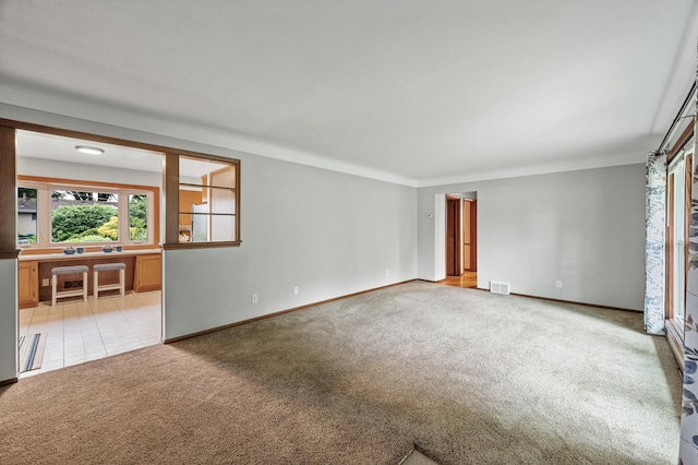 6781 Plaza Curv NE, Fridley, MN 55432 - unfurnished room with light colored carpet and baseboards