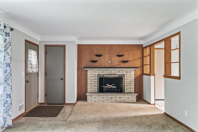 6781 Plaza Curv NE, Fridley, MN 55432 - unfurnished living room featuring carpet floors and a fireplace