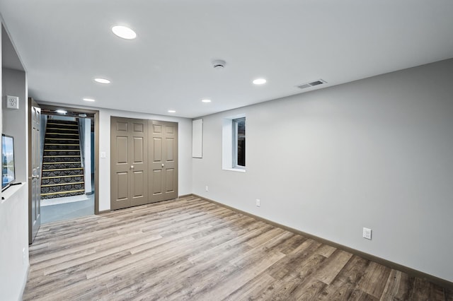 6781 Plaza Curv NE, Fridley, MN 55432 - unfurnished bedroom featuring wood finished floors, recessed lighting, and a closet