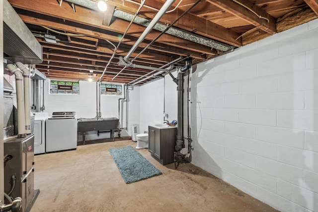 6781 Plaza Curv NE, Fridley, MN 55432 - basement featuring separate washer and dryer and a sink