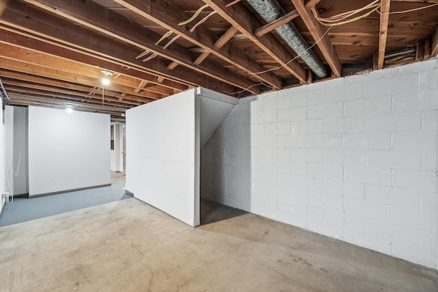 6781 Plaza Curv NE, Fridley, MN 55432 - unfinished basement with concrete block wall
