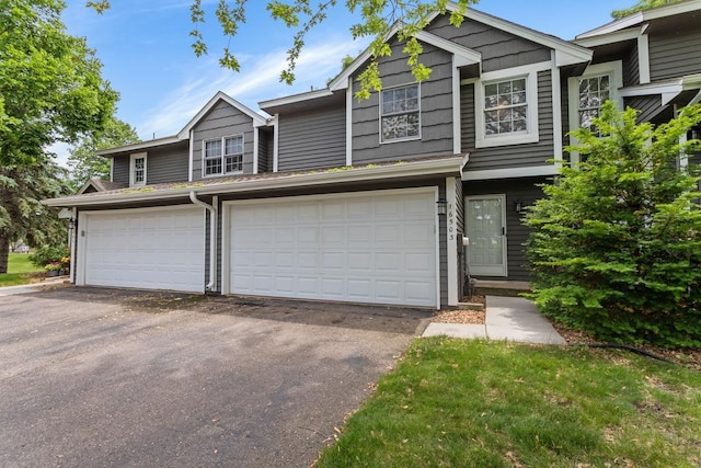 16503 Biscayne Blvd, Eden Prairie, MN 55347 - multi unit property with driveway and an attached garage